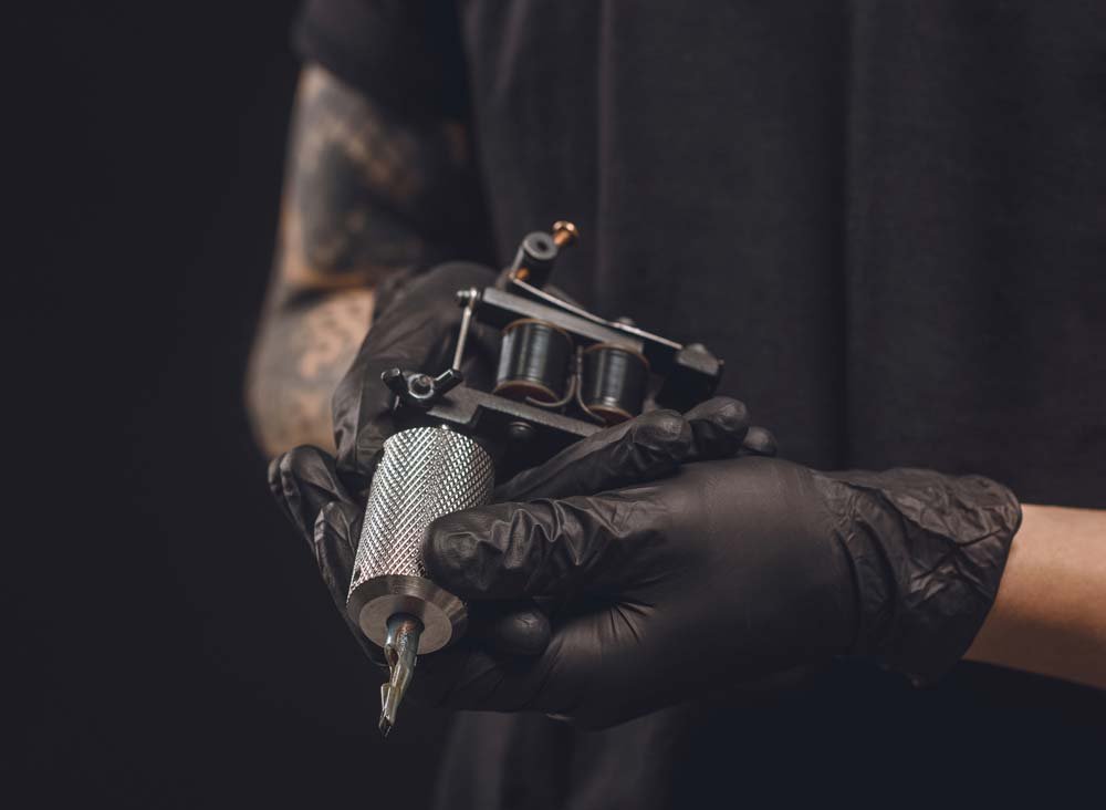 tattoo tradition vs innovation shown through graphic tattoo style contrast