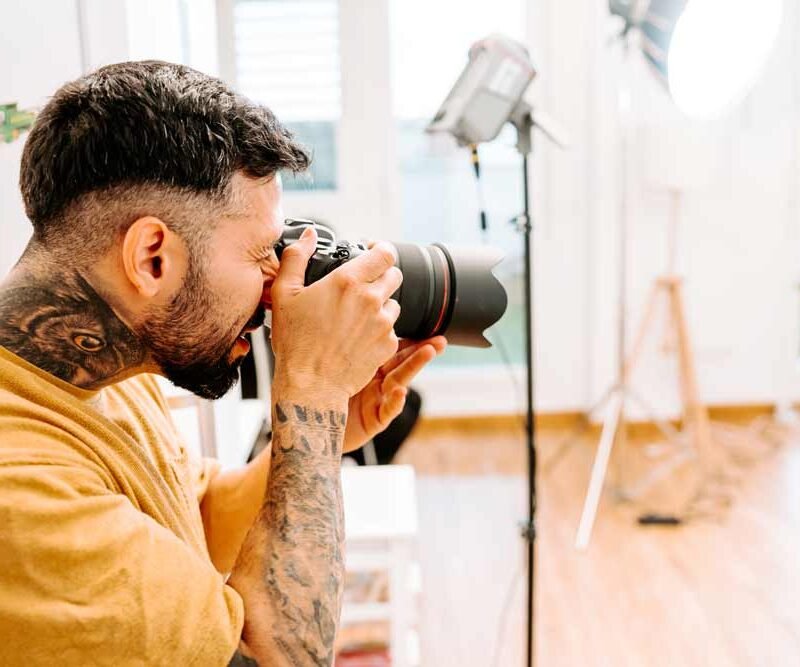 Tattoo artist photographs tattoos for portfolio