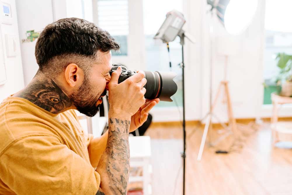 Tattoo artist photographs tattoos for portfolio