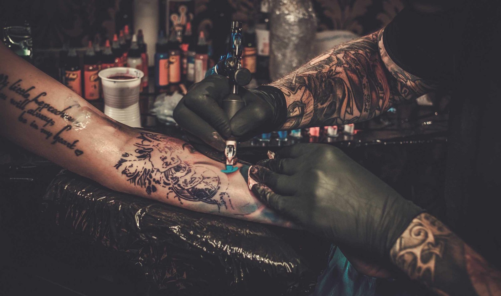 tattoo artist using the same equipment to improve through practice